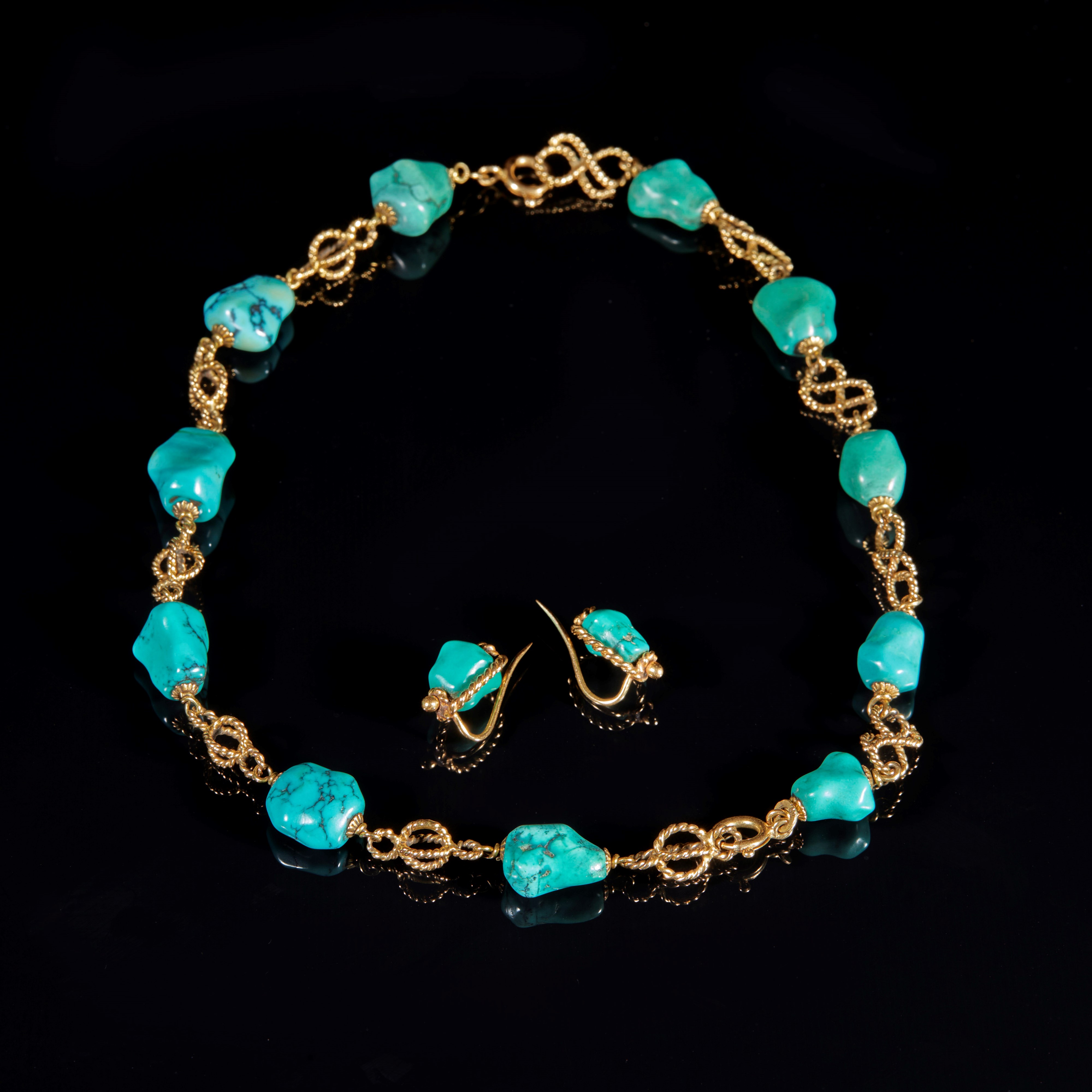 Demiparure in oro giallo e turchesi