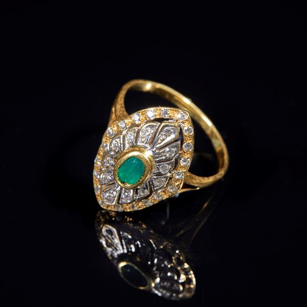 Anello in oro giallo e bianco