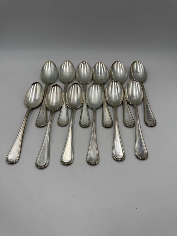 Set di 12 cucchiai in argento