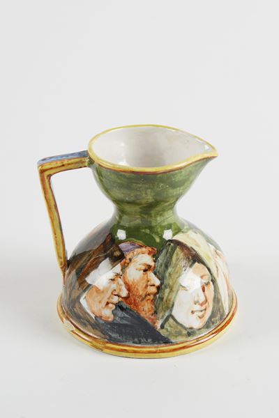 Versatoio in ceramica policroma decorato con figure religiose