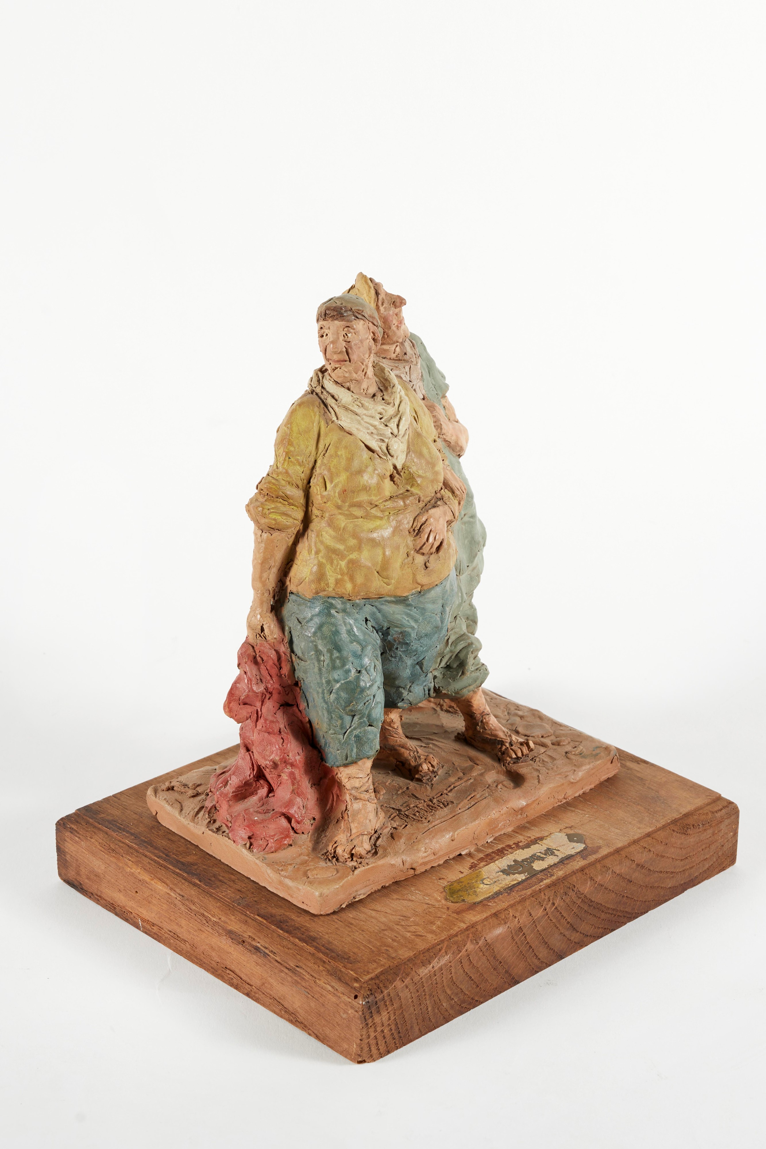 Cleto Tomba - A passeggio, scultura in terracotta policroma