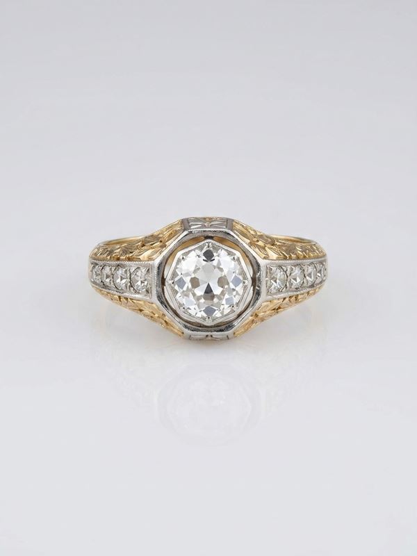 Anello in oro giallo e bianco