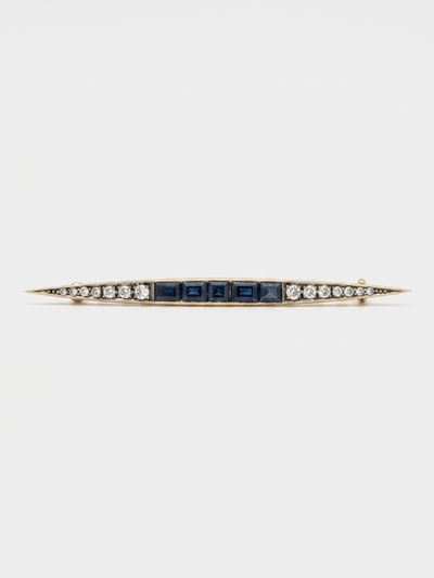 Spilla a barretta, oro 18K e argento, zaffiri blu baguette e rose di diamante
