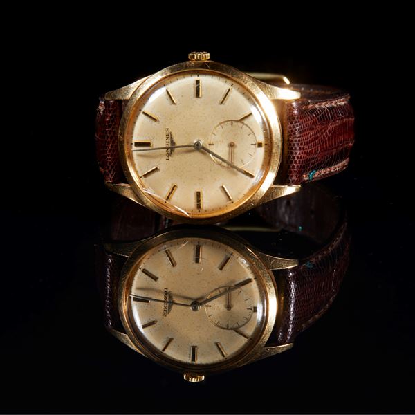 Due orologi con cassa in oro